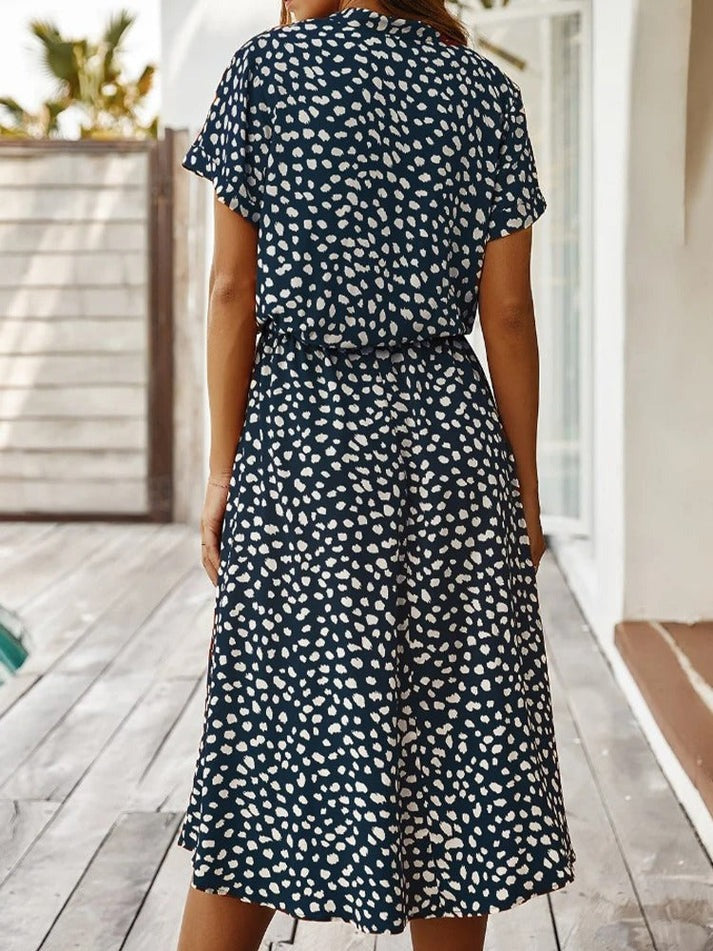 Florine | luchtige midi jurk elegante pasvorm strik