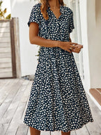 Florine | luchtige midi jurk elegante pasvorm strik